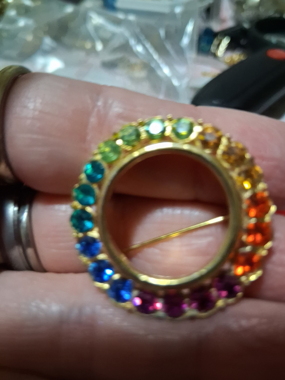 Source Unknown Gold-Tone Rainbow Crystal Circle Brooch